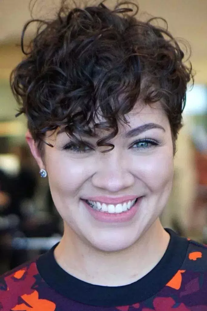 Trendy Short Curly Haircuts with Bangs for Women | Modern & Chic Styles
